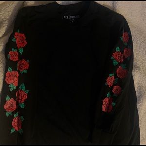 Black crew neck with rose detailing